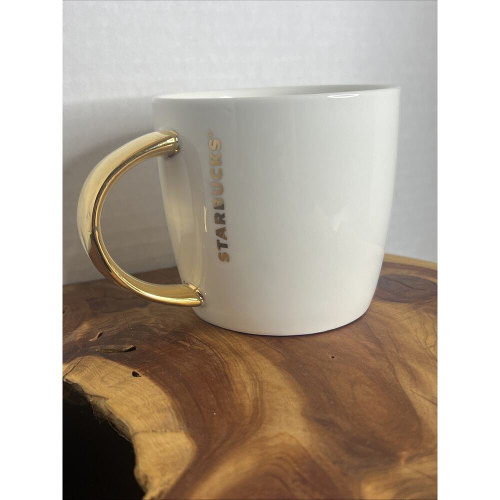 Gold Starbucks mug 14 fluid oz 2015